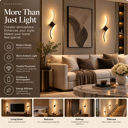 Two black S-curve wall lights either side of artwork in a living room